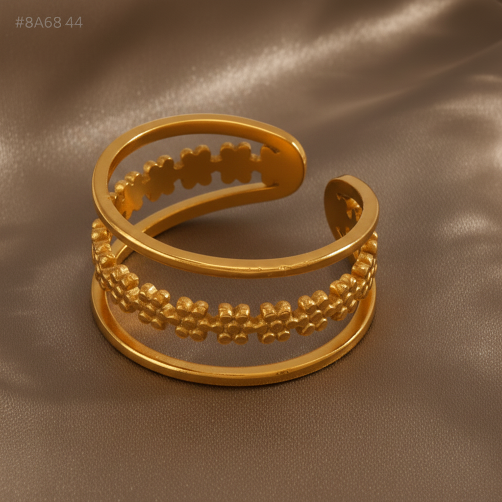 Bague bandeau ajustable en acier inoxydable doré, ornée d'une couronne de fleurs.