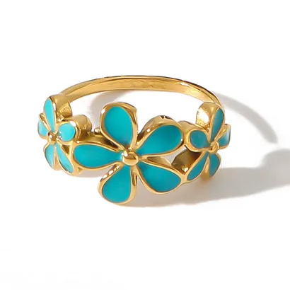 Bague dorée ajustable en acier inoxydable avec trois fleurs en émail bleu