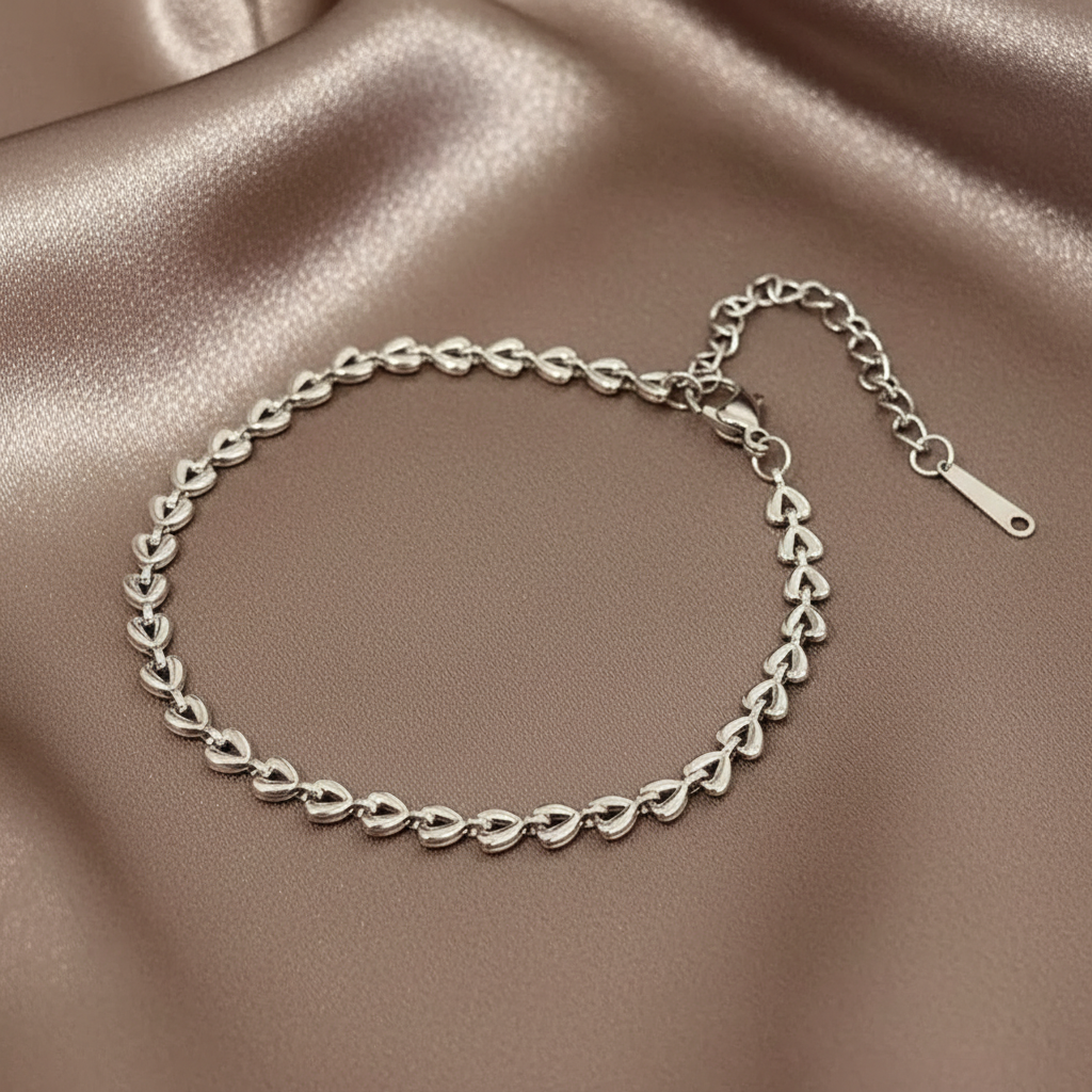 Bracelet argenté en acier inoxydable 316L à chaîne de coeurs.