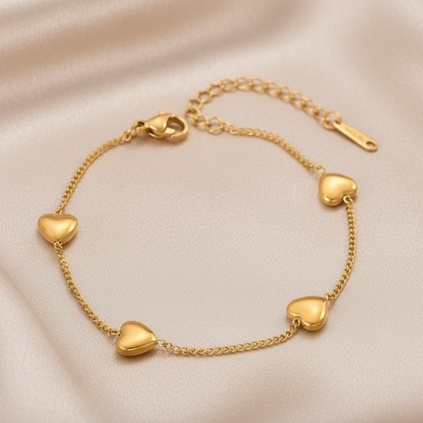 Bracelet femme en acier inoxydable doré, maille gourmette fine ornée de 4 cœurs, style bohème élégant
