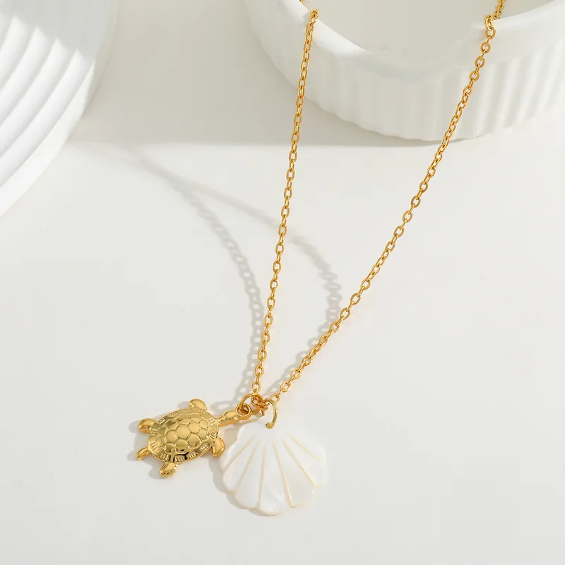 Collier NATURE en acier chirurgical et nacre assorti d'une tortue ou d'un dauphin
