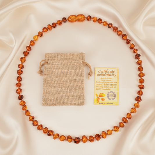 Collier en ambre orange pour bébé avec son certificat d'authenticité