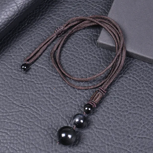 Pendentif trio en obsidienne boules de 16, 12 et 8 mm avec cordon en nylon marron, bijou naturel.