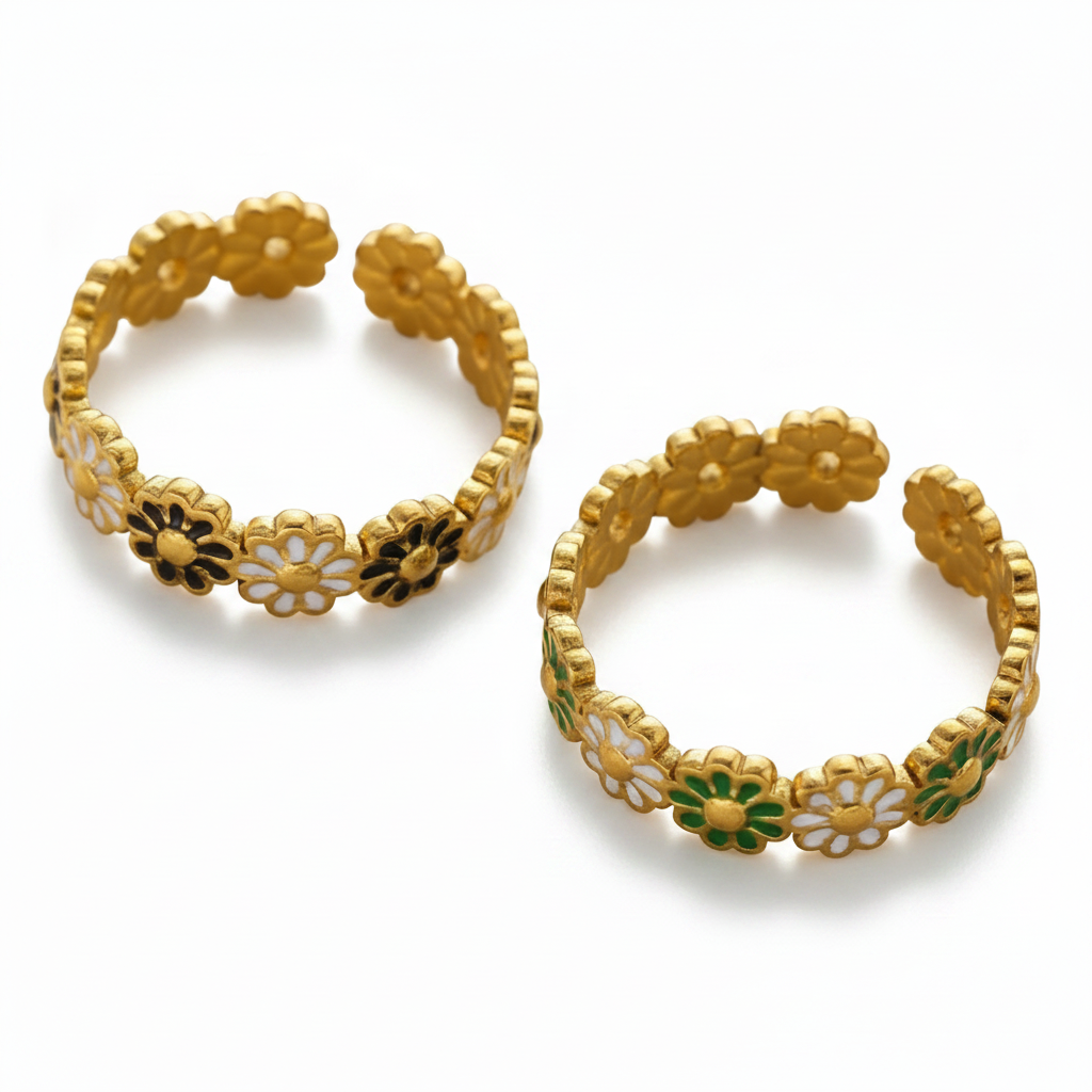 Bagues couronne de fleurs en acier inoxydable doré et émail noir ou vert et blanc.