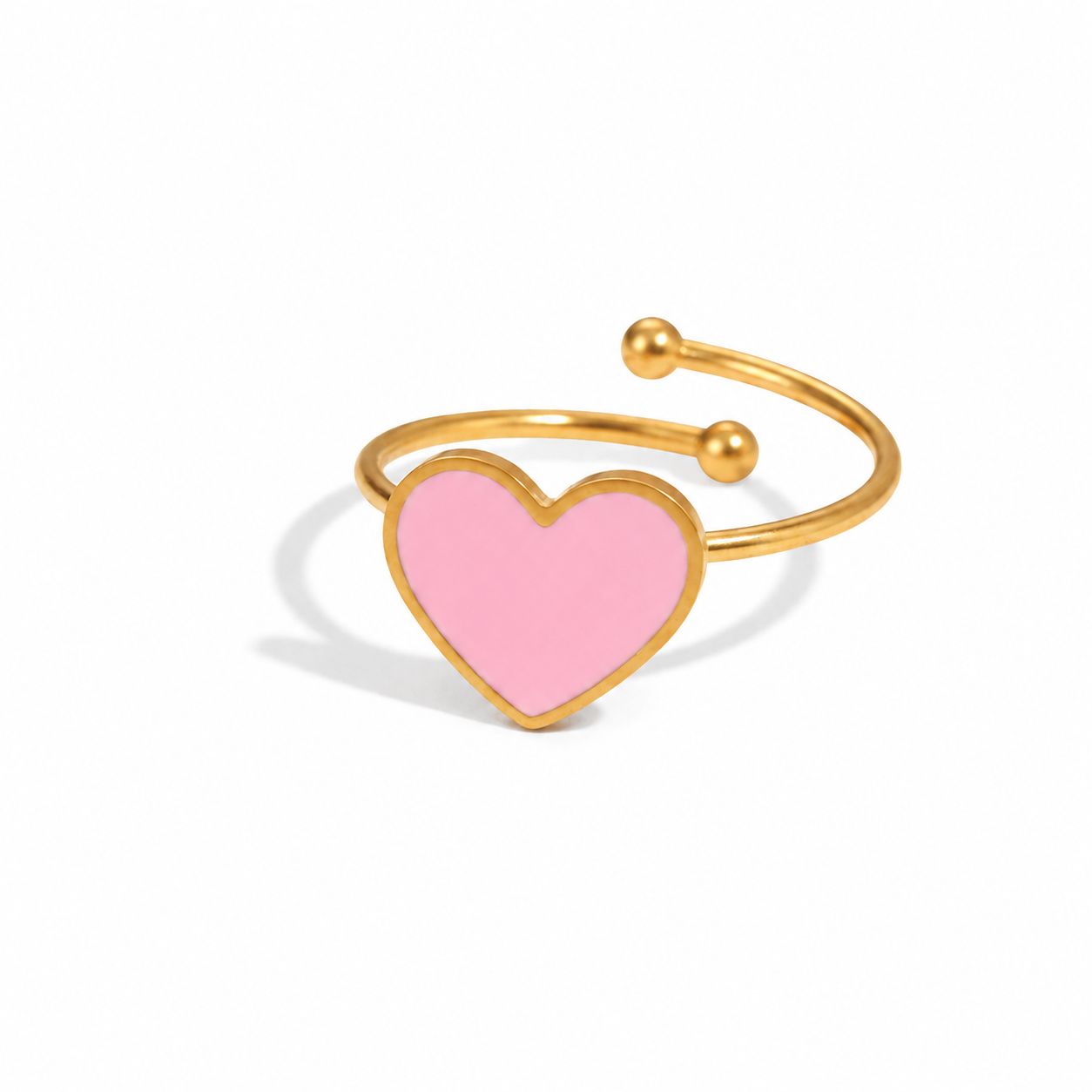 Bague enfant coeur en émail rose et acier inoxydable doré.