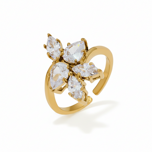 Bague fleur dorée en acier inoxydable 316L avec zircons blancs.