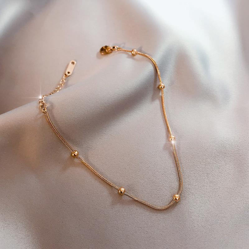 Bracelet femme en acier inoxydable doré, fine maille serpent perlée, style bohème élégant