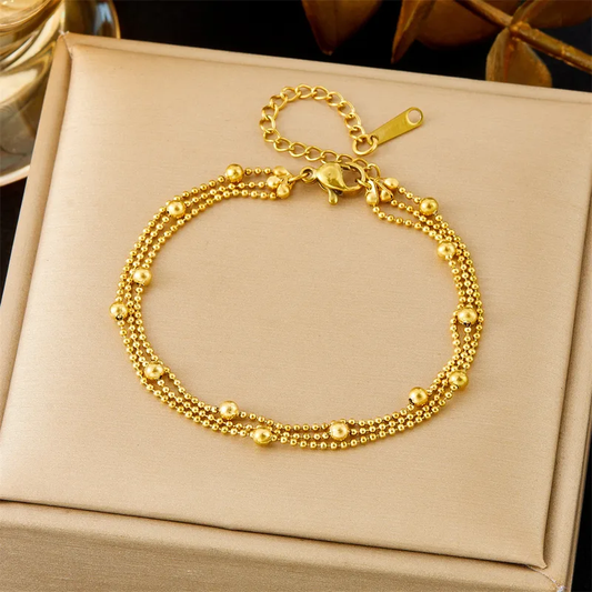 Bracelet acier inoxydable doré triple chaîne à billes rondes avec perles dorées, bijou chic femme