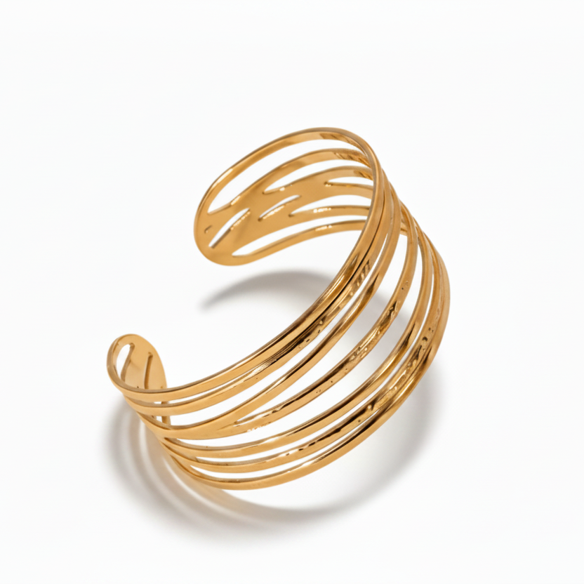 Bracelet manchette doré en acier inoxydable 316L.