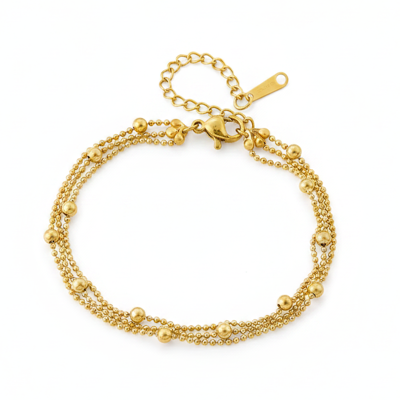 Bracelet doré en acier inoxydable 316L triple chaîne à billes et perles.
