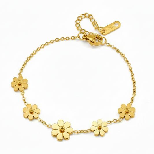 Bracelet en acier inoxydable 316L doré à chaîne fine orné de 5 petites fleurs dont 1 centrale légèrement plus grande.