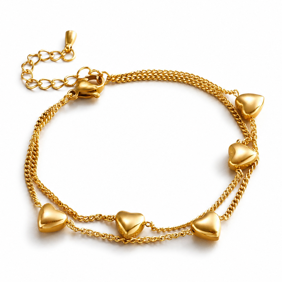 Bracelet doré en acier inoxydable 316L à double maille gourmette et 5 coeurs.
