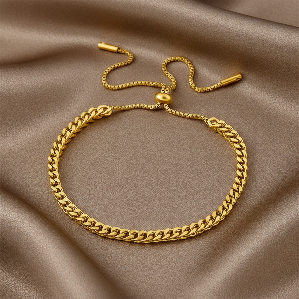 Bracelet doré en acier inoxydable 316L à maille cubaine épaisse de 3 mm avec fermeture ajustable coulissante.
