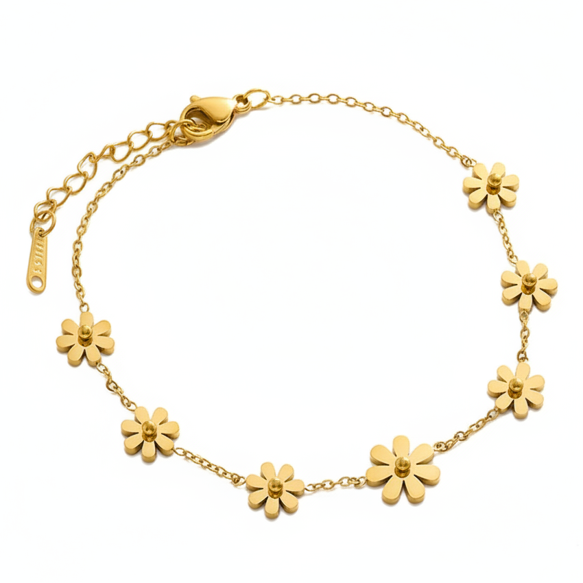 Bracelet de chaville en acier inoxydable 316L doré à chaîne fine ornée de 7 petites fleurs délicates.