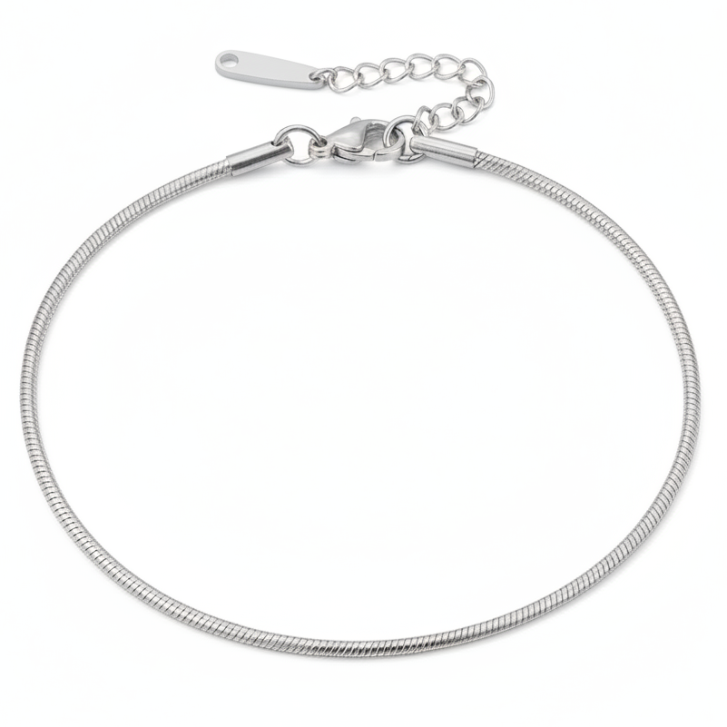 Bracelet de cheville argenté en acier inoxydable 316L à fine chaîne serpent.