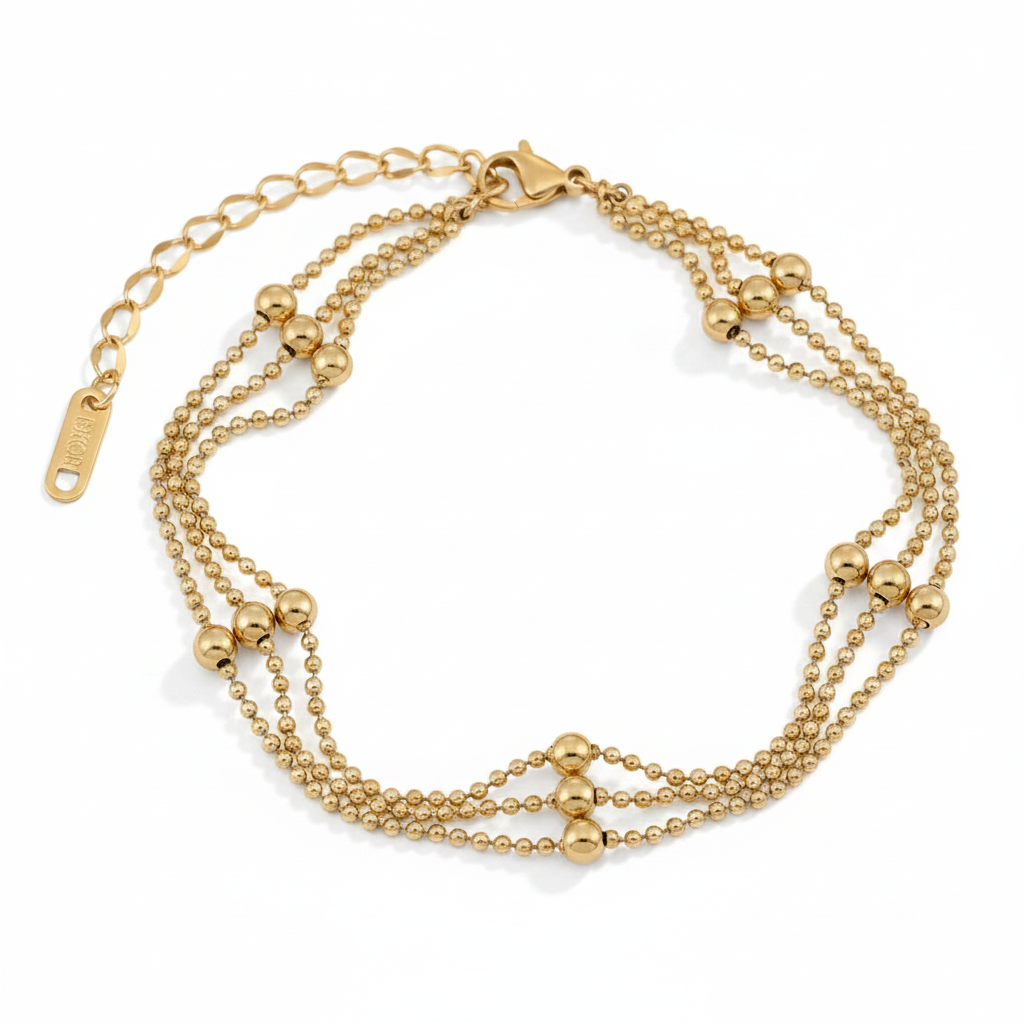 Bracelet de cheville doré en acier inoxydable 316L à triple chaîne à billes et perles.
