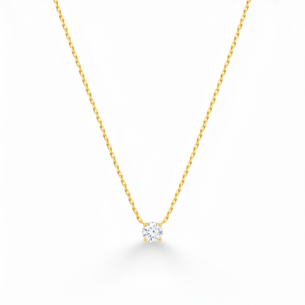 Collier en acier inoxydable 316L doré à chaîne ultra fine maille bambou et pendentif petit rond en zircon blanc.