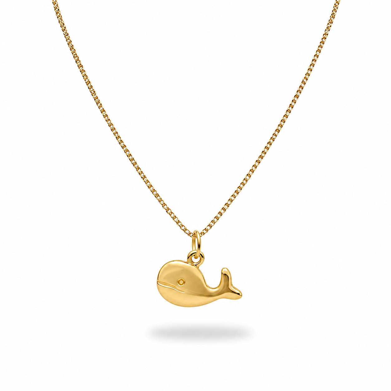 Collier enfant en acier inoxydable 316L doré, à chaîne fine maille gourmette et pendentif baleine.