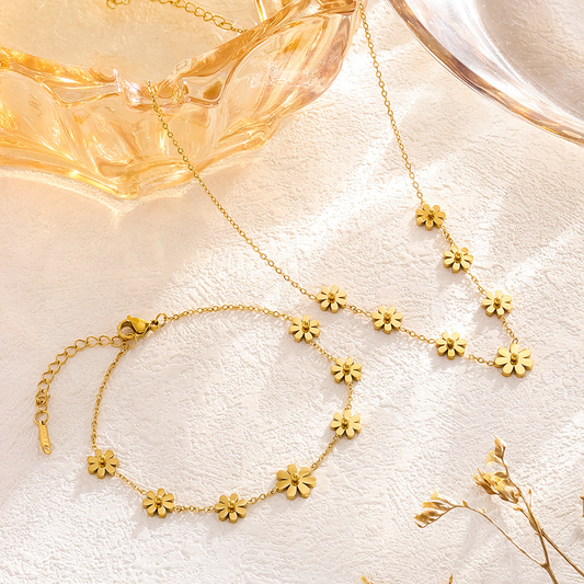 Parure Fleurs EDEN en acier chirurgical doré – Collier & Bracelet ajustables.