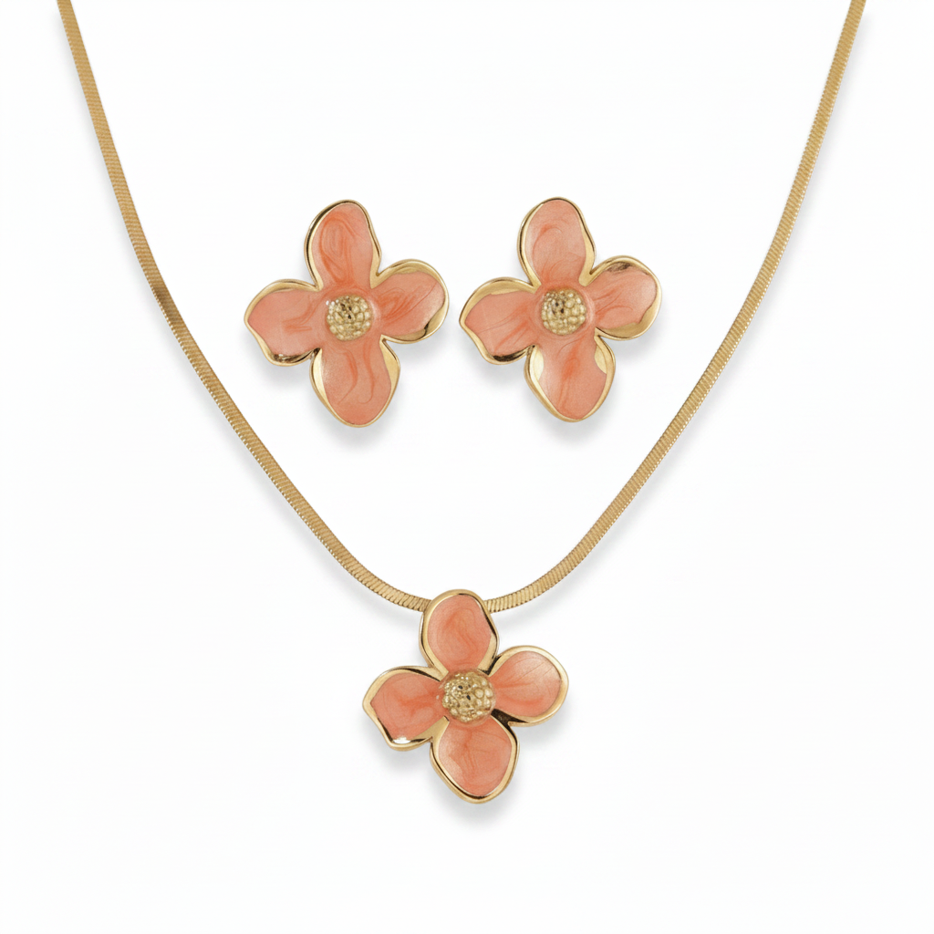 Parure grande fleur émaillée rouge en acier inoxydable doré composée d'un collier à maille serpent et boucles d'oreilles.
