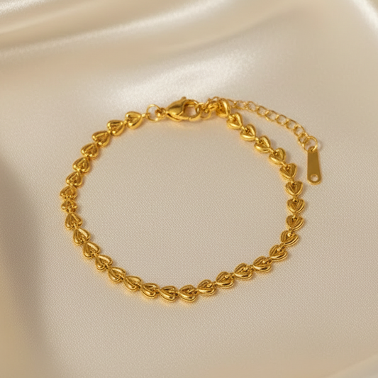 Bracelet doré en acier inoxydable 316L à chaîne de coeurs.