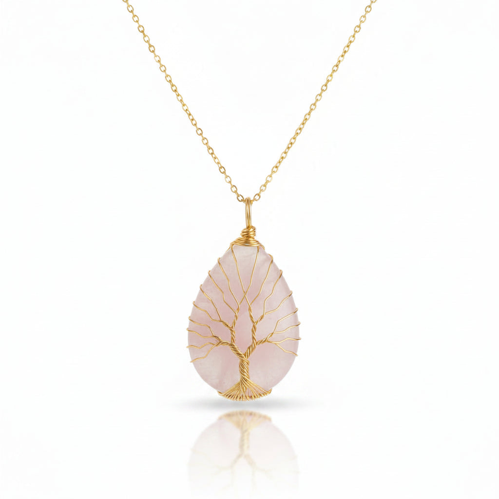 Collier en acier inoxydable doré avec pendentif Arbre de Vie en cristal de roche forme goutte d'eau.